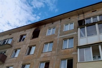 Окно квартиры после пожара